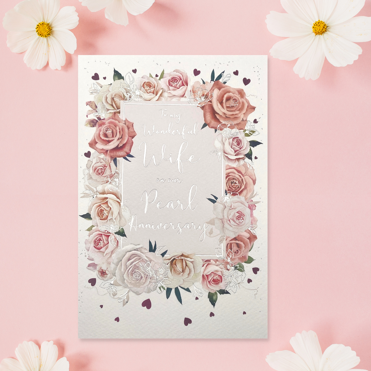 Silver text surrounded by roses border