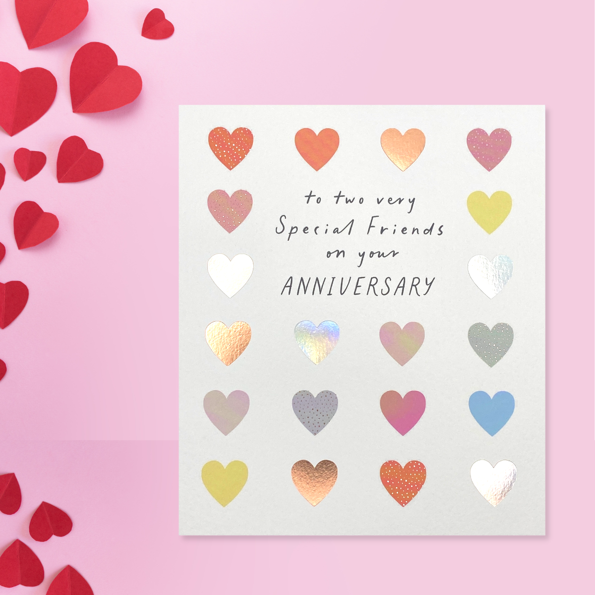 Square card with multiple hearts in various colours with black text
