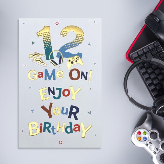White card with funky text, gamer items and trainers