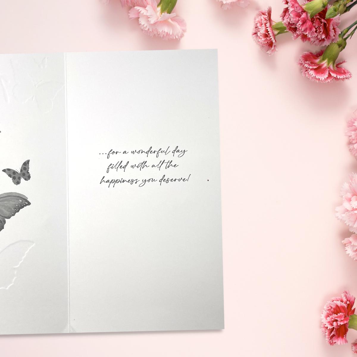 Inside image with greyscale text and butterflies