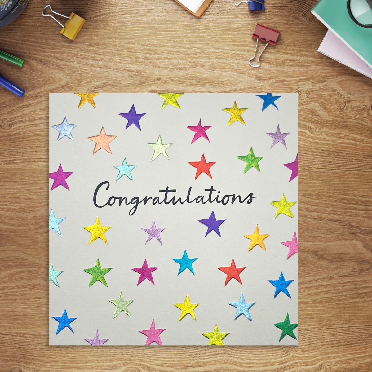 White square card with multicolour stars