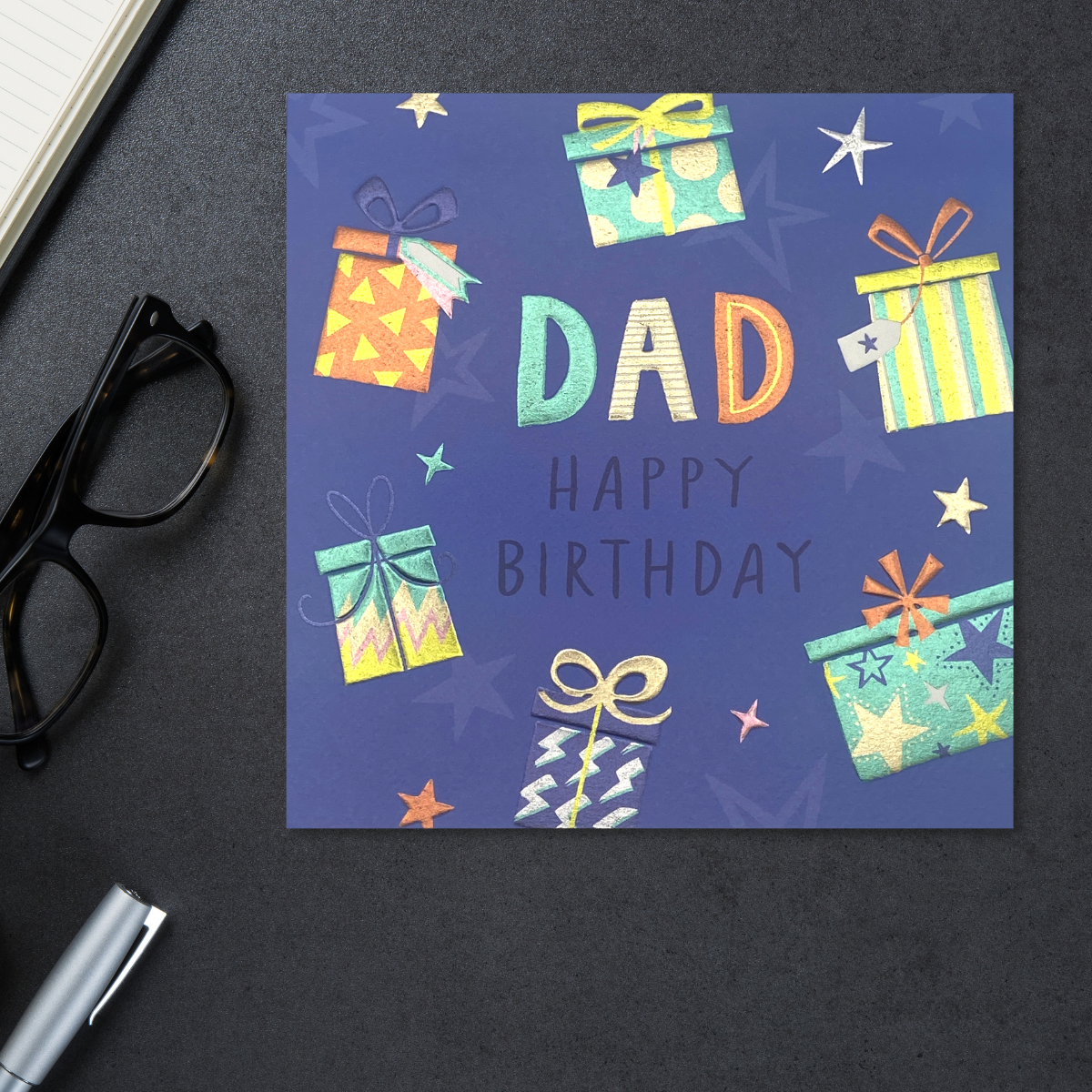 Blue square card with multicolour gifts and stars