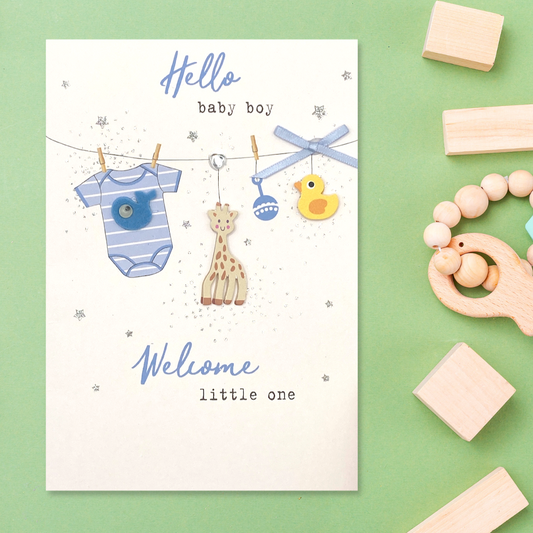 Front image showing washing line with baby clothes