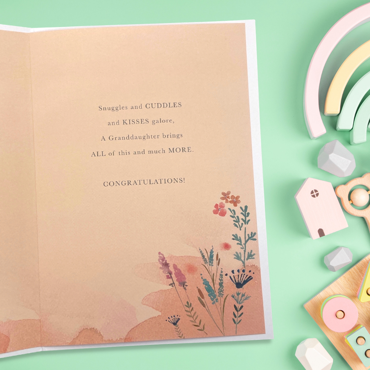 Inside image with peach colour and flowers beside verse