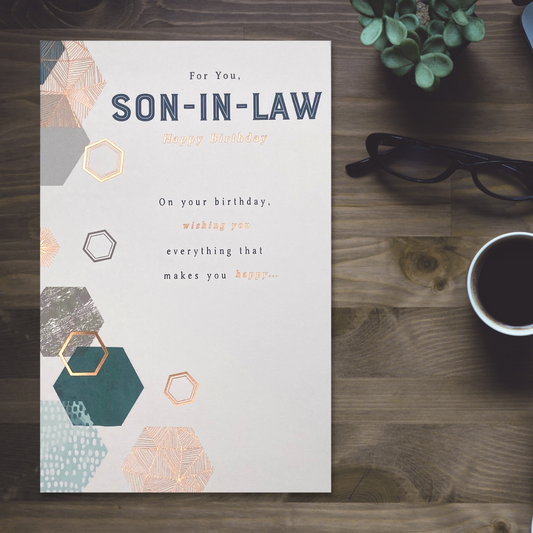 White card with blue and copper hexagons