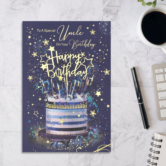 Blue Card with blue and white striped cake and candles. Gold foil details