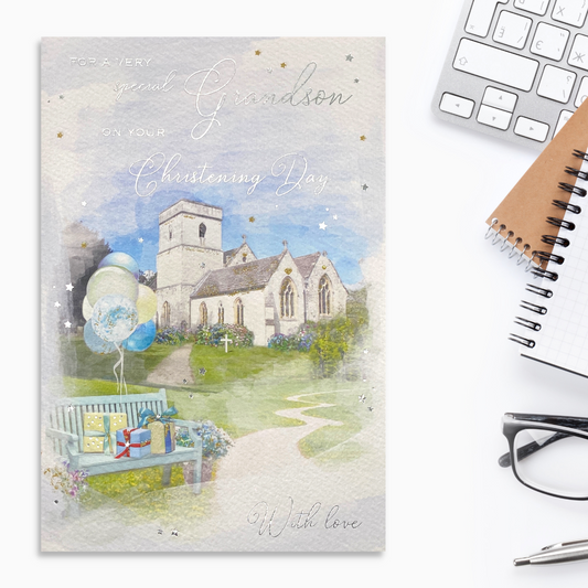 Front image with church, bench with gifts and balloons and silver text