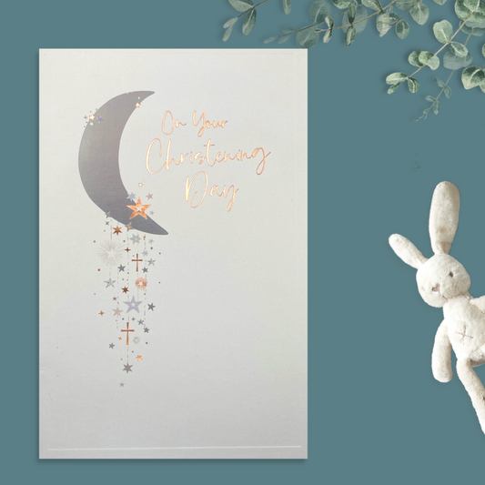 Front image with white card, moon and stars and rose gold text