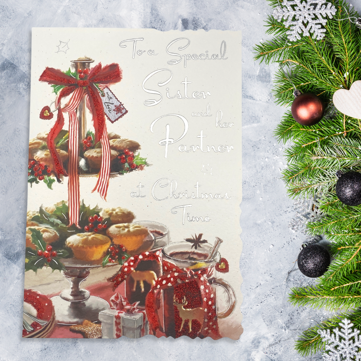 Mince pies and milled wine with holly berry design