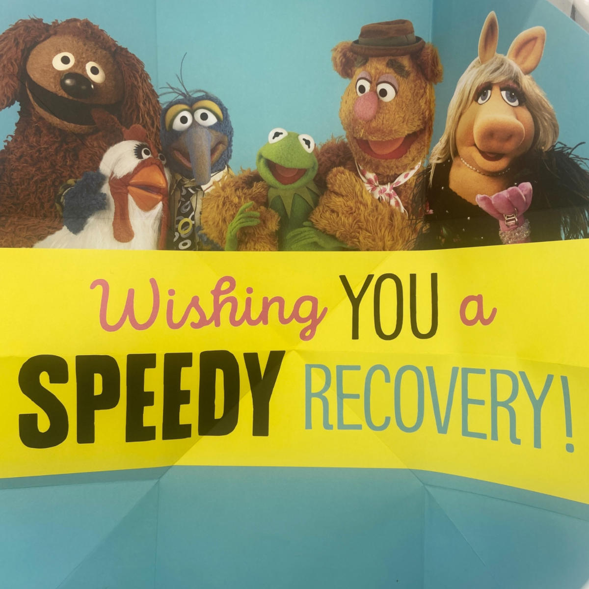 Inside image with the gang and a banner with text