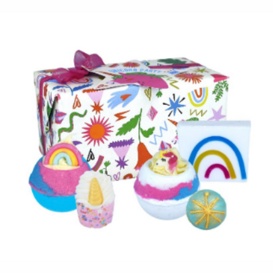 A mix of unicorn and rainbow themed bath bombs all wrapped in a funky wrapped box with pink ribbon