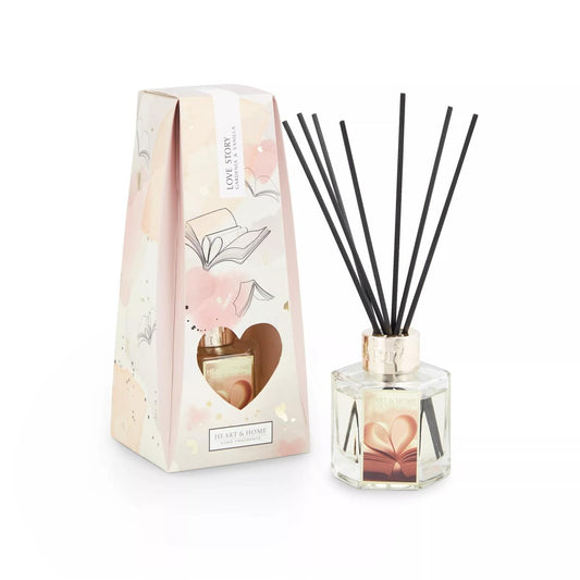 Pretty pink and cream box with heart shape cut out and displayed diffuser with black reeds