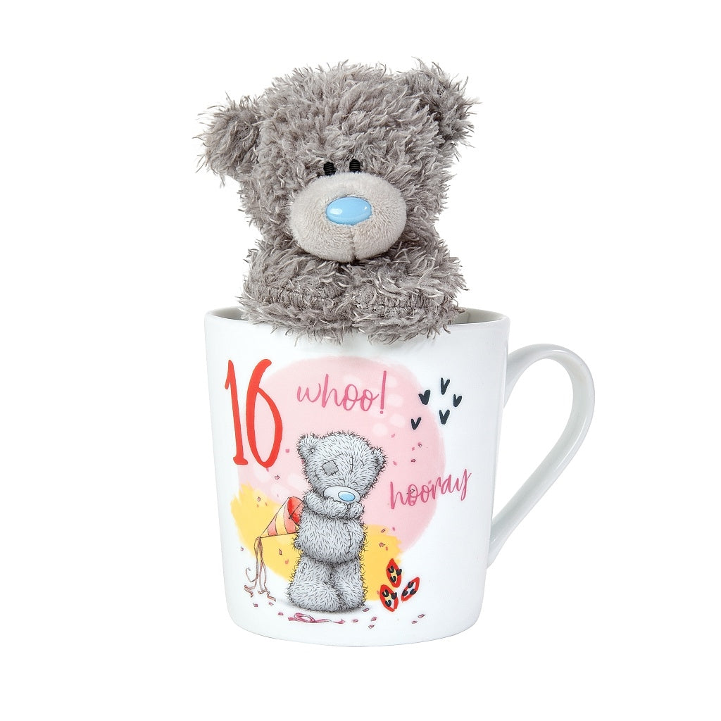 Image with box removed and plush inside mug