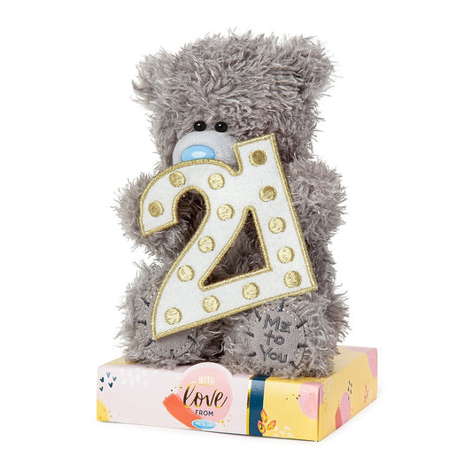 Image of Tatty teddy with 21st numbers on colourful plinth