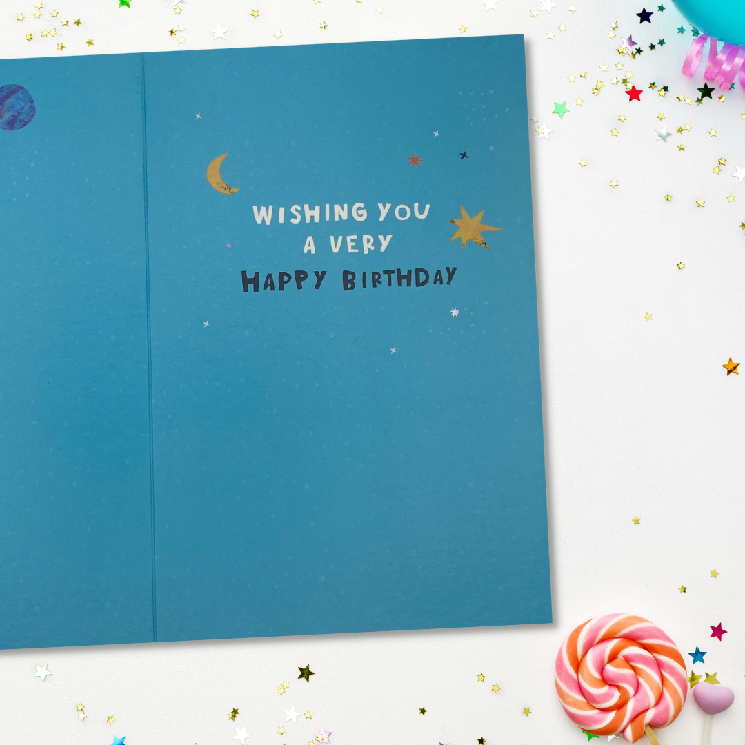 Brightly coloured card with further planets and stars and text