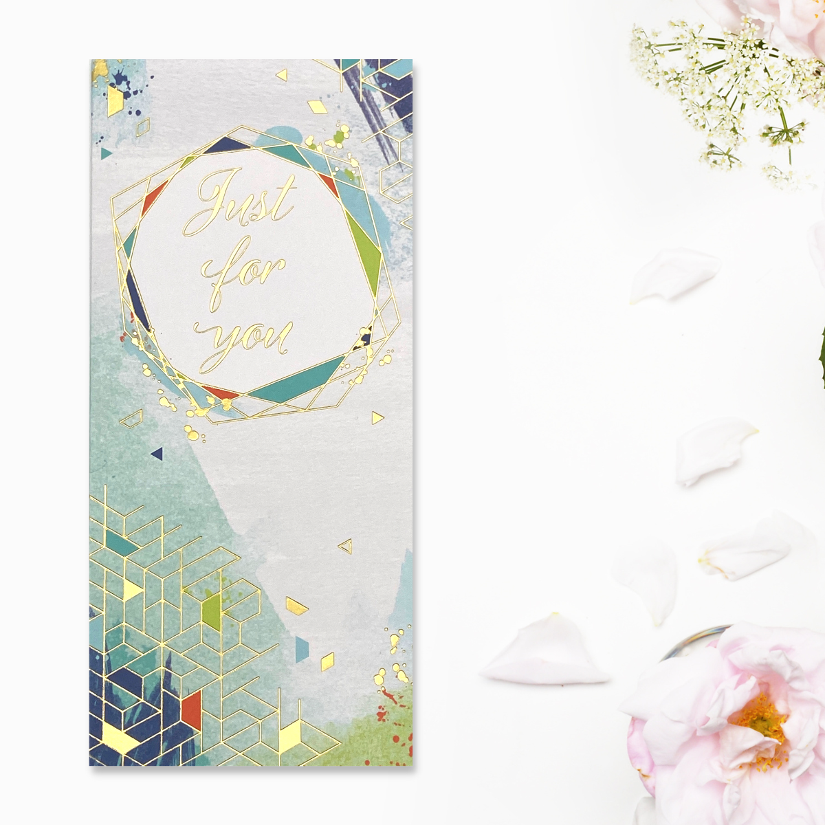 Slim money wallet with blue and green watercolour background and gold foil hexagon design