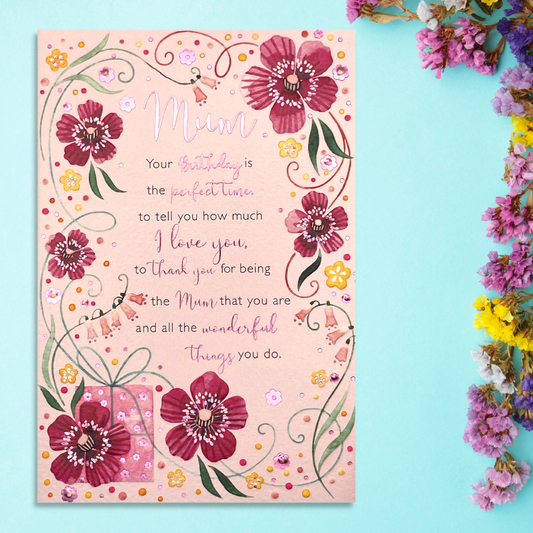 Front image with pink card and red floral border alongside verse