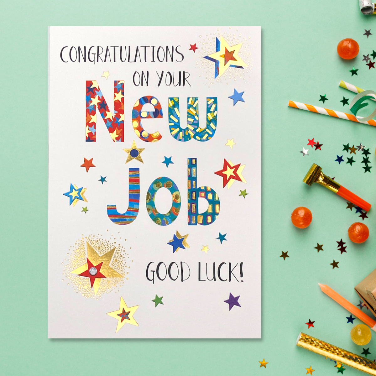 Multicolour text with stars and gold foil details