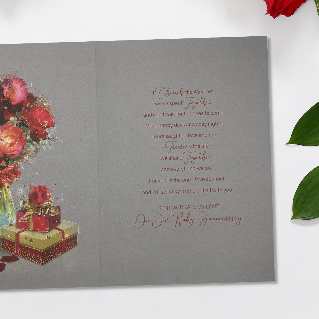Inside image with red flowers in vase and verse