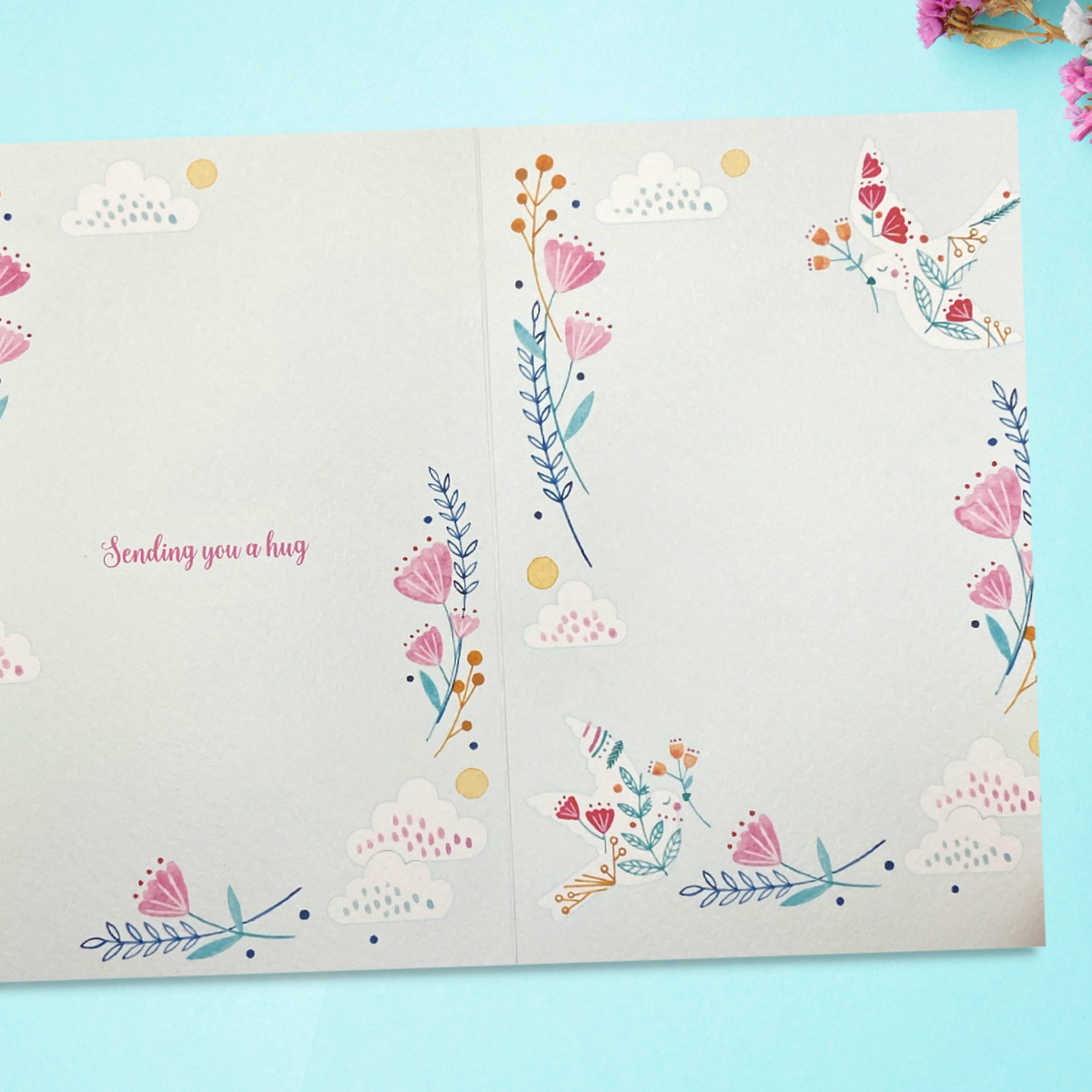 Two further pages with floral decoration and text