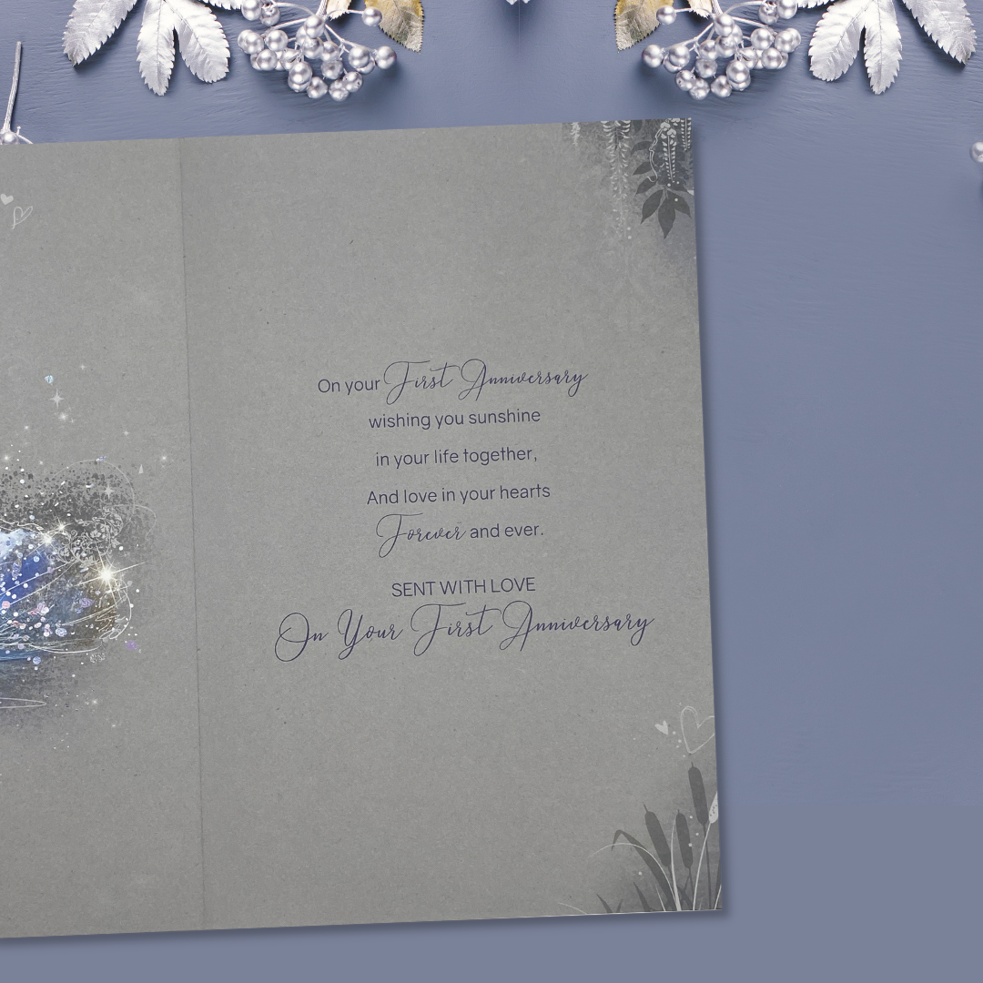 Inside image with grey card, colour text and swans