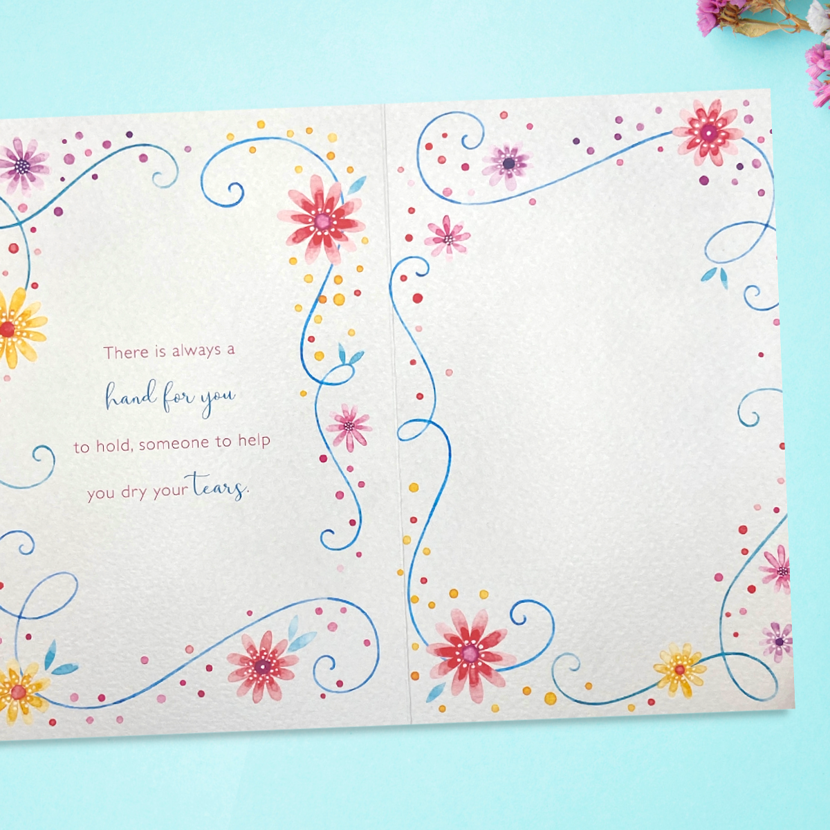 Inside image with one page of verse and further floral decorations