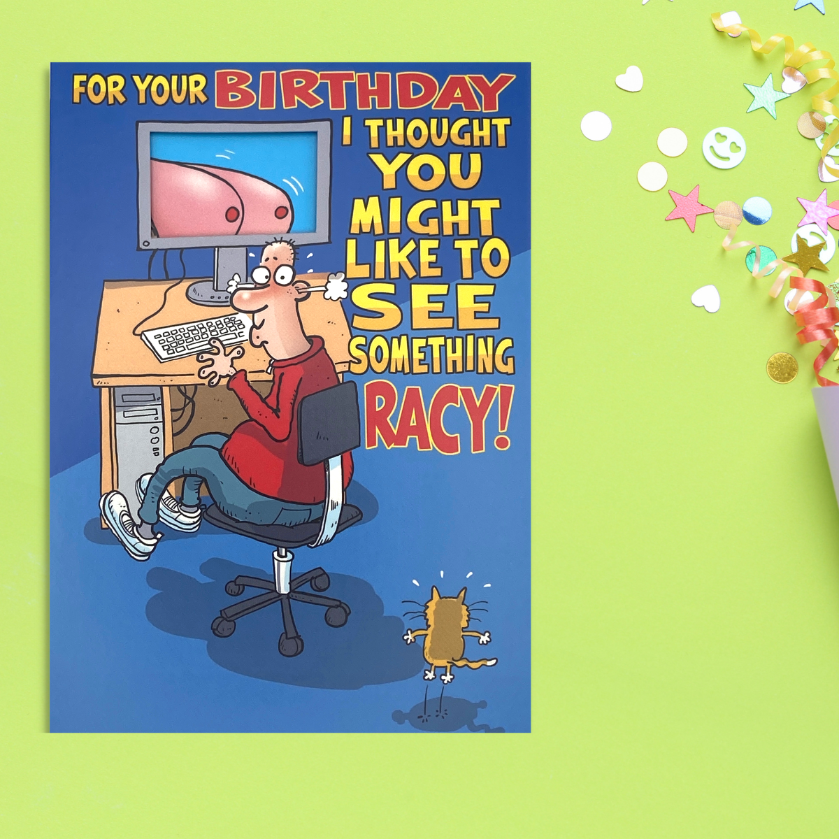 Man watching computer screen with what appears to be boobs on screen