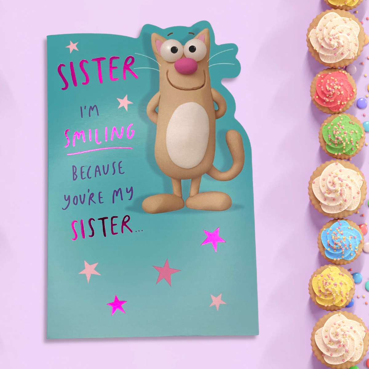 green card with cartoon cat and pink stars and verse