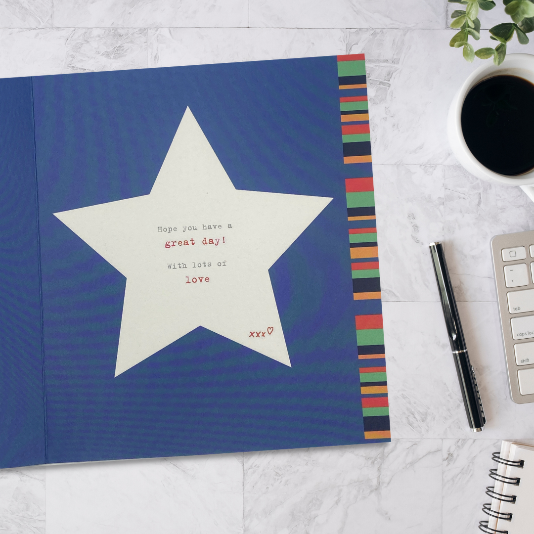 Inside image with blue background white star and coloured border.