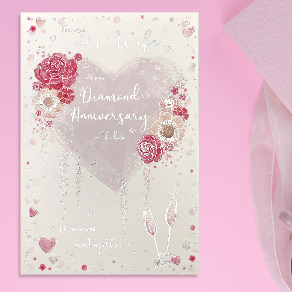 Front image with red and silver floral heart and verse