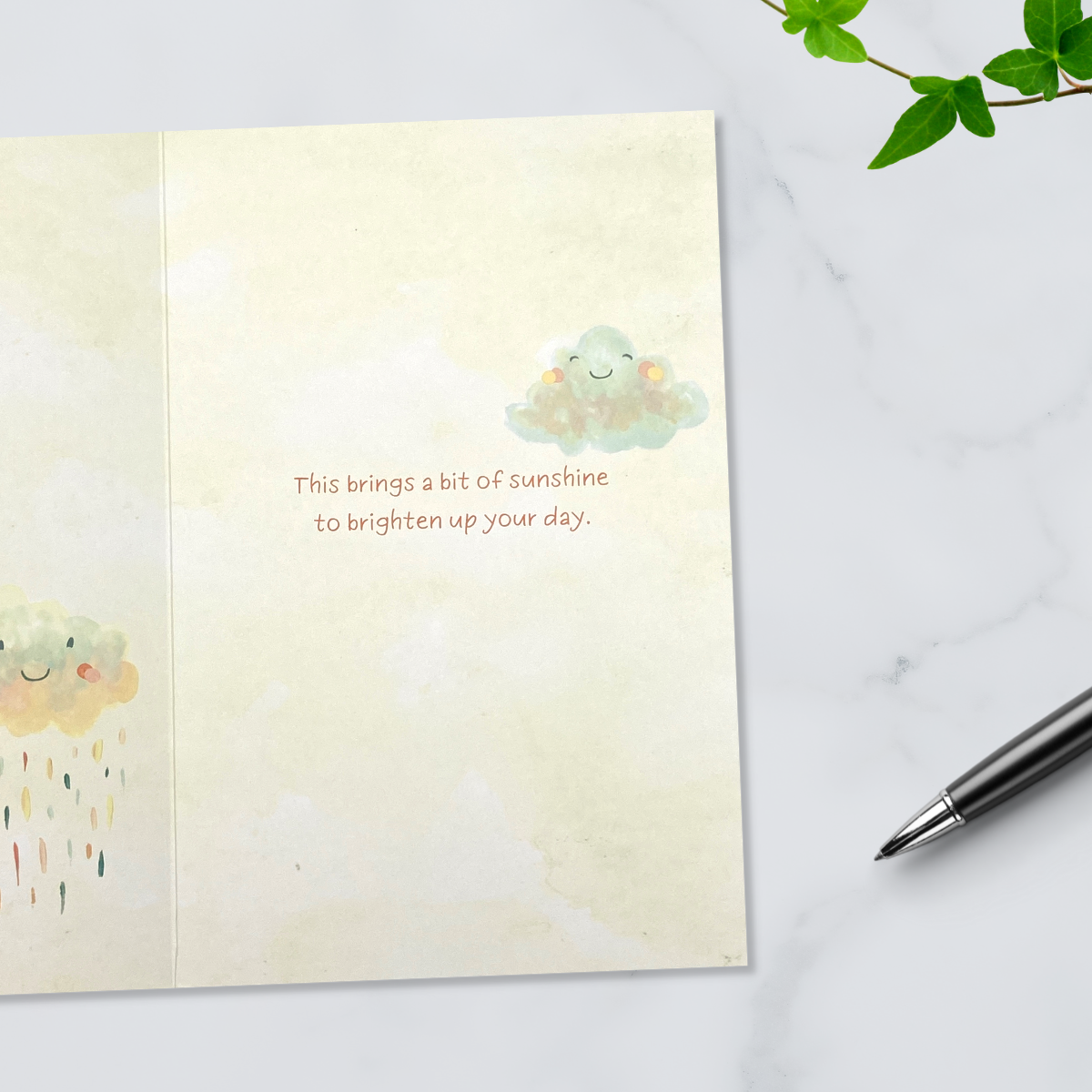 Cream colour print inside with smiley clouds and verse