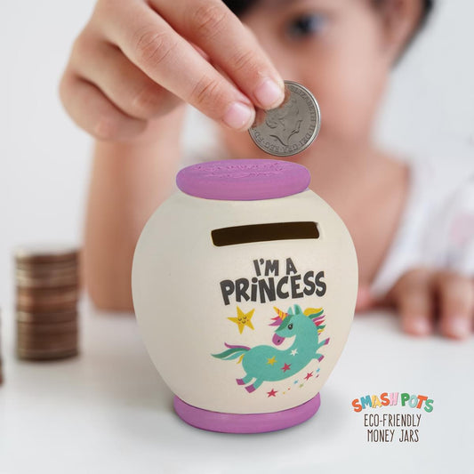 Small single use I'm A Princess Smash pot money box. In ivory with lilac top and base. With colourful unicorn image. Once full, smash pot and can be buried in the compost heap!