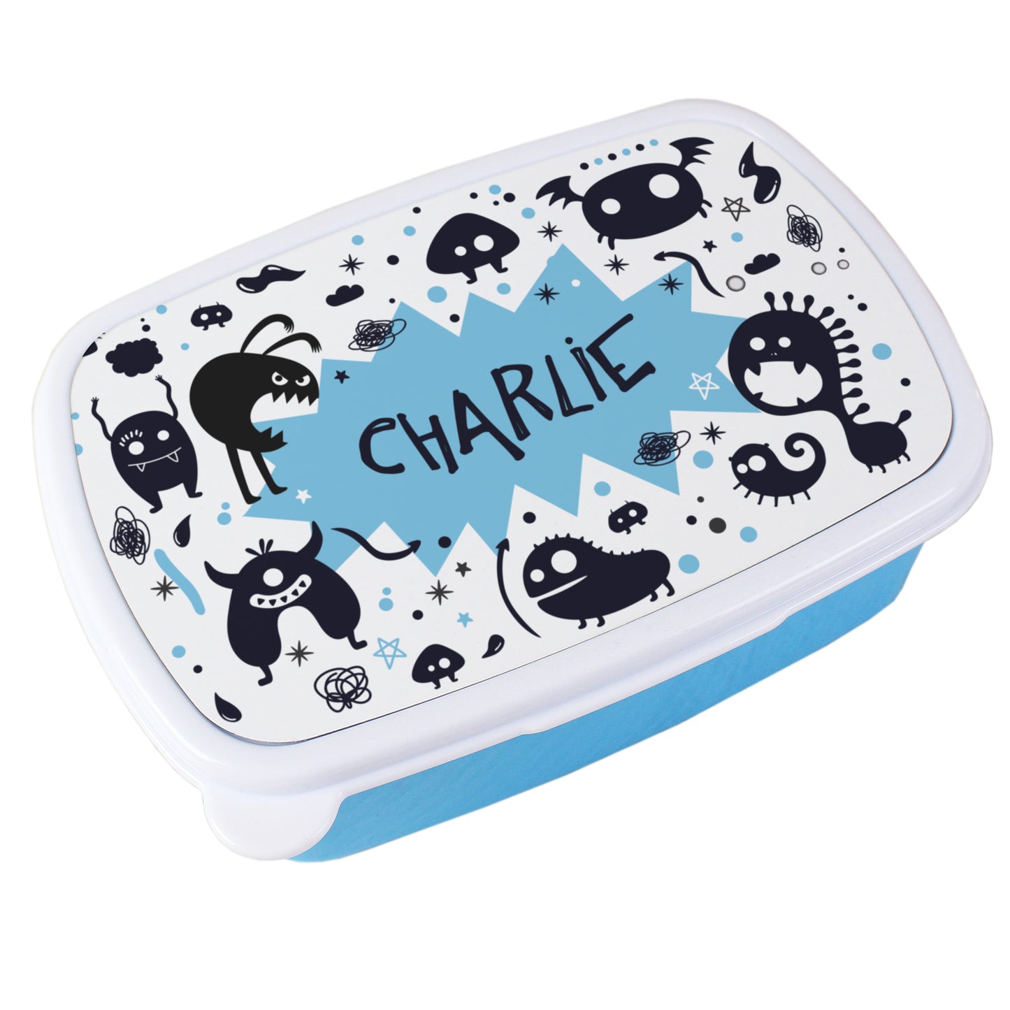 lunch box with cartoon monsters and the name 'Charlie' on a white background