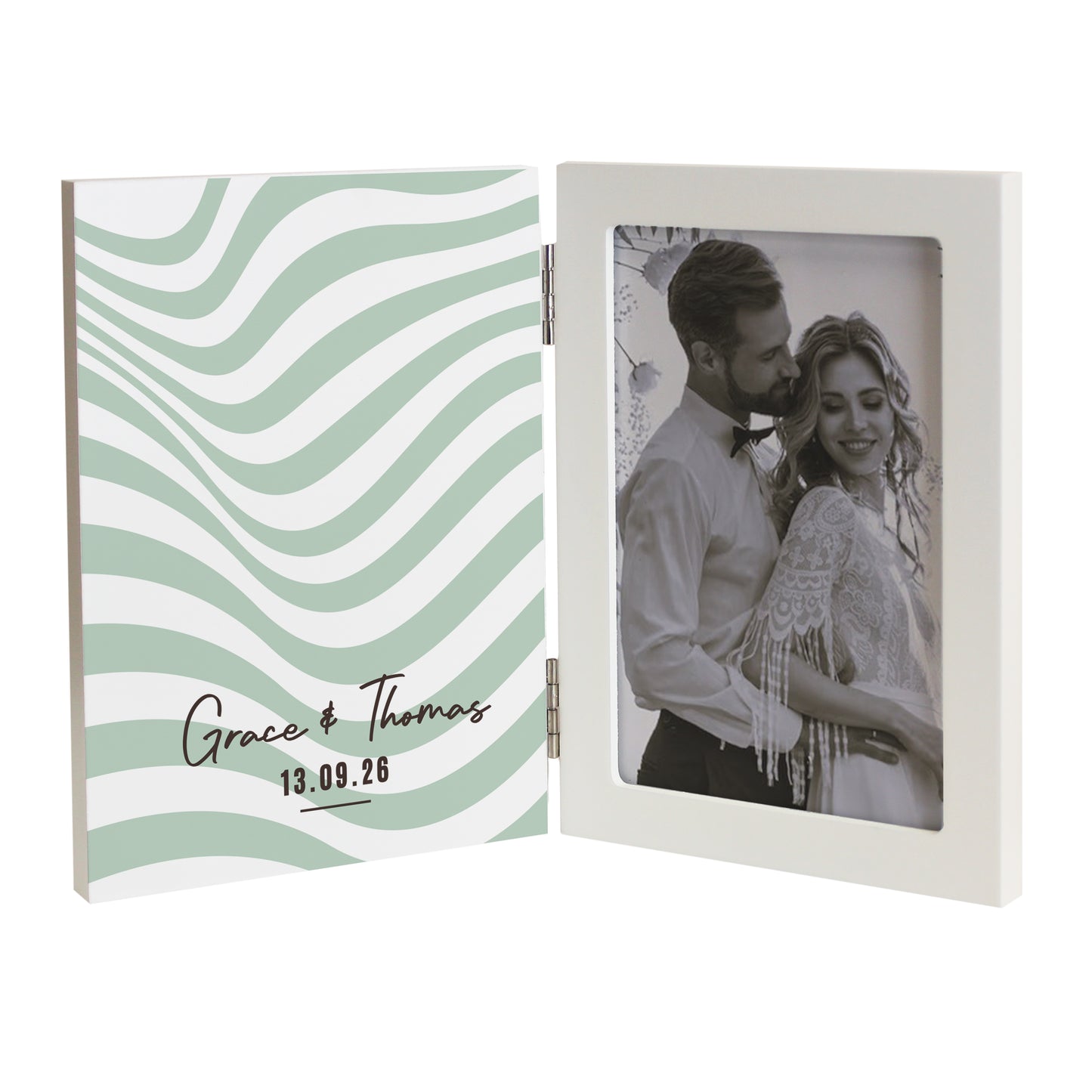 Hinged photo frame with wavy design on one side and a couple on the other