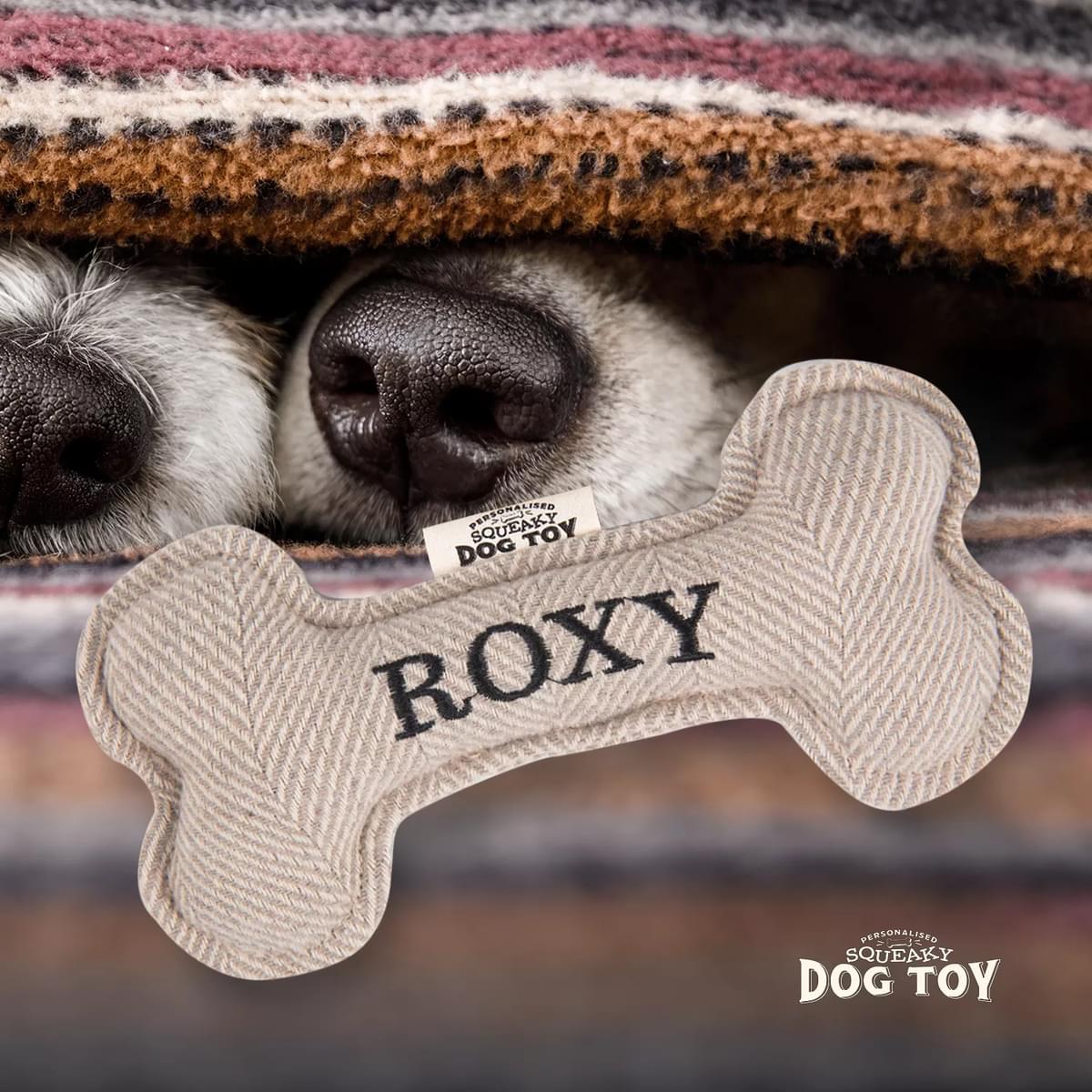 Named Squeaky Dog Toy- Roxy. Bone shaped herringbone tweed pattern dog toy.