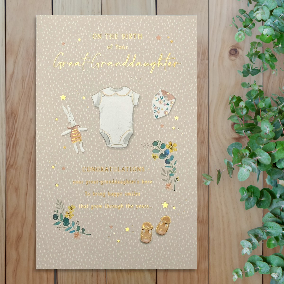 Cream card with dotty design, vest, bunny, shoes and floral details with verse