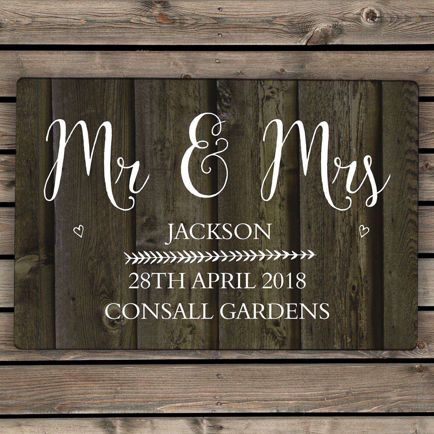 Metal wood wedding sign with Welcome To Our Wedding and personalised message and date.