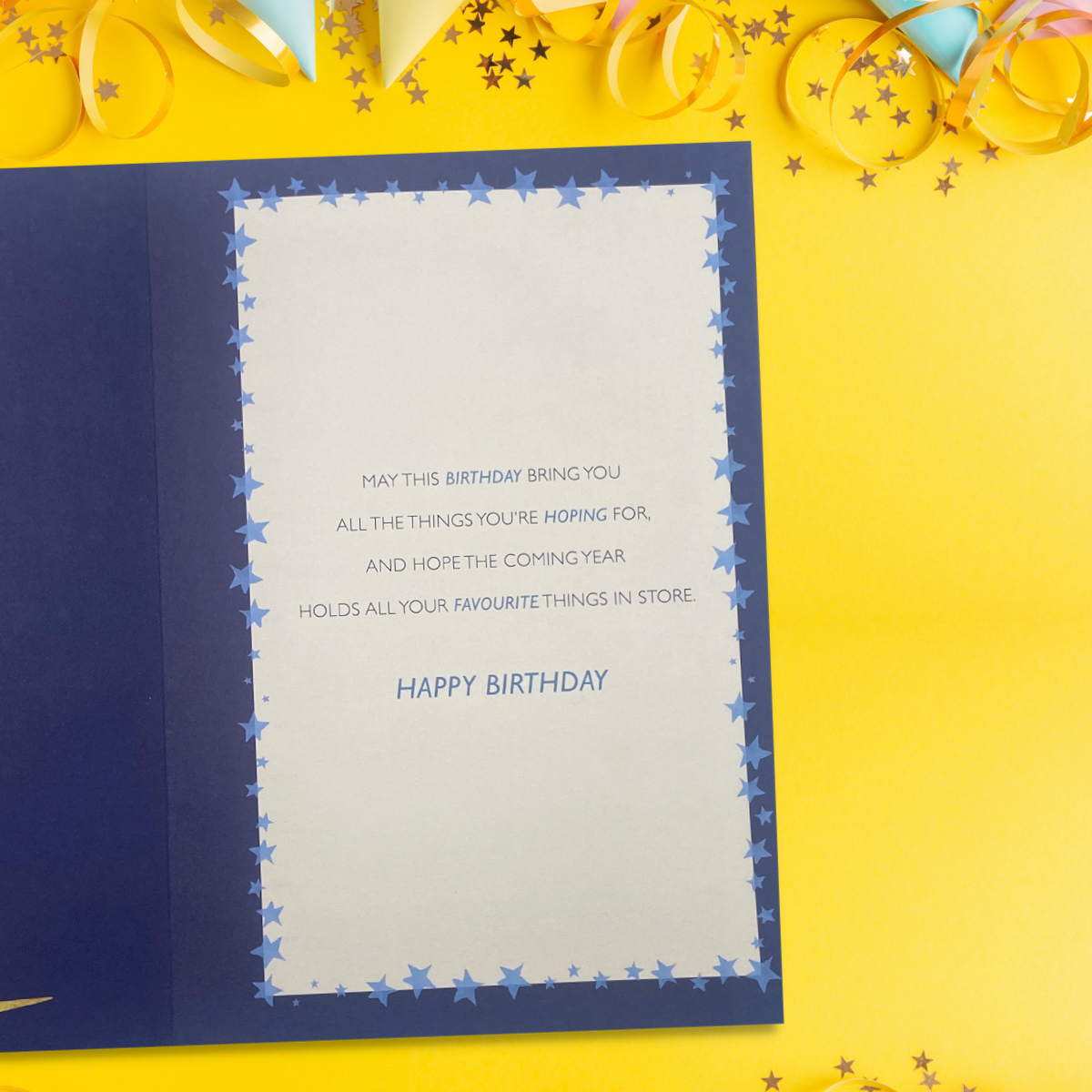 inside with colour print blue border and stars with verse