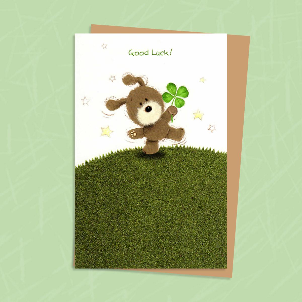Lots Of Woof Good Luck Card Alongside Its Envelope