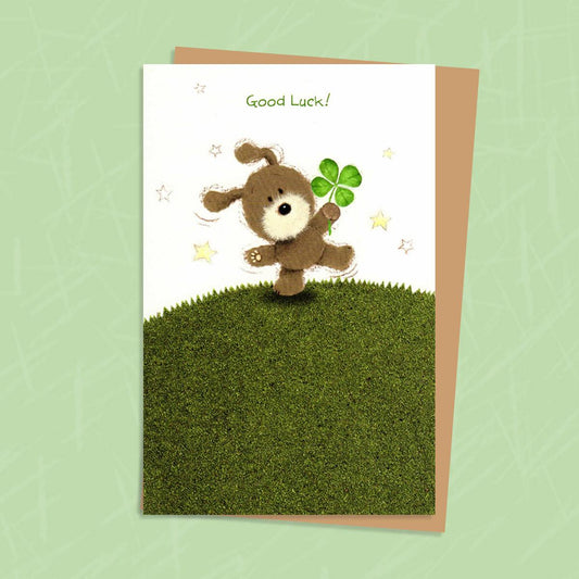 Lots Of Woof Good Luck Card Alongside Its Envelope