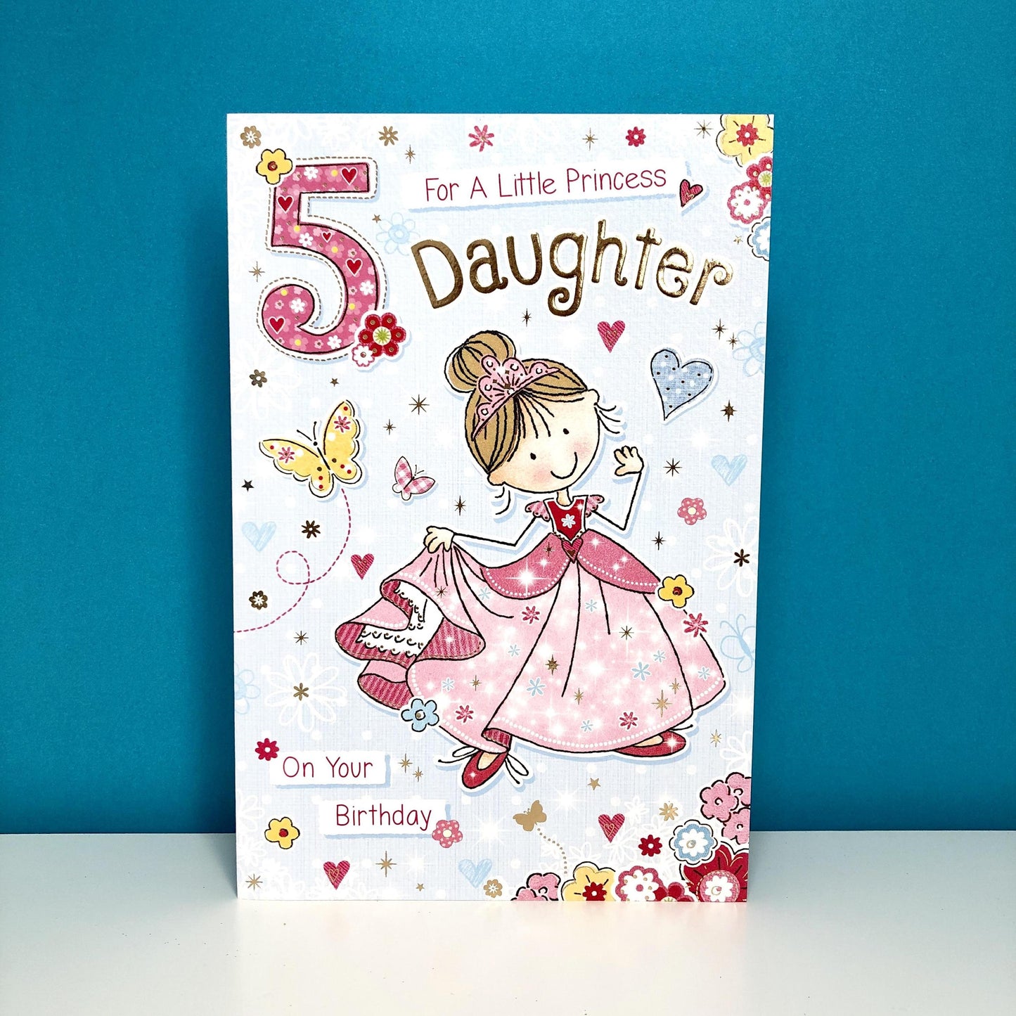 Daughter Age 5 Birthday Card Sitting On The Shelf