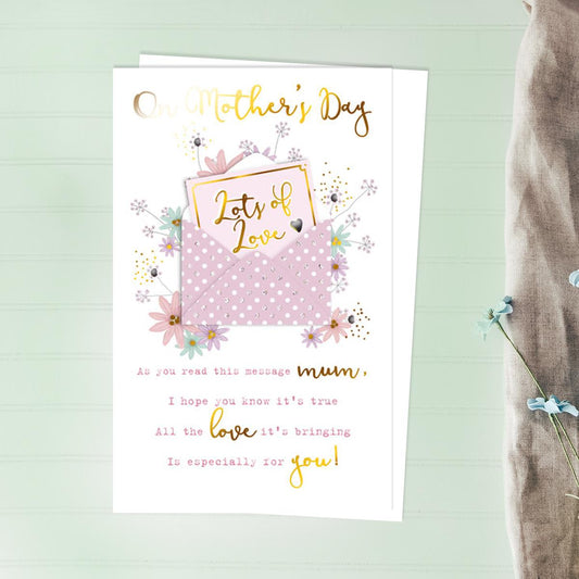 Lots Of Love Floral Envelope Mother's Day Card Alongside Its White Envelope