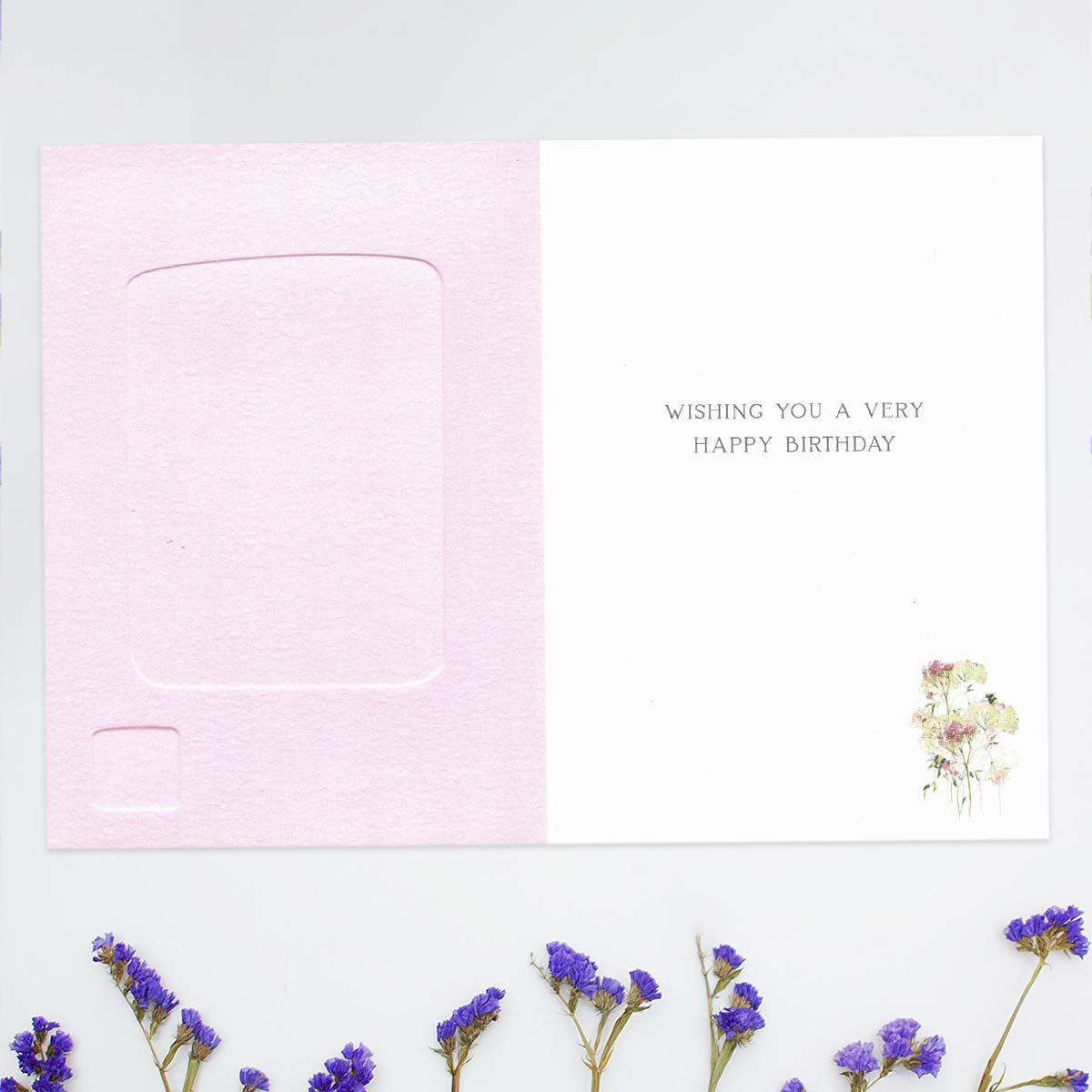 Inside with colour print and greeting