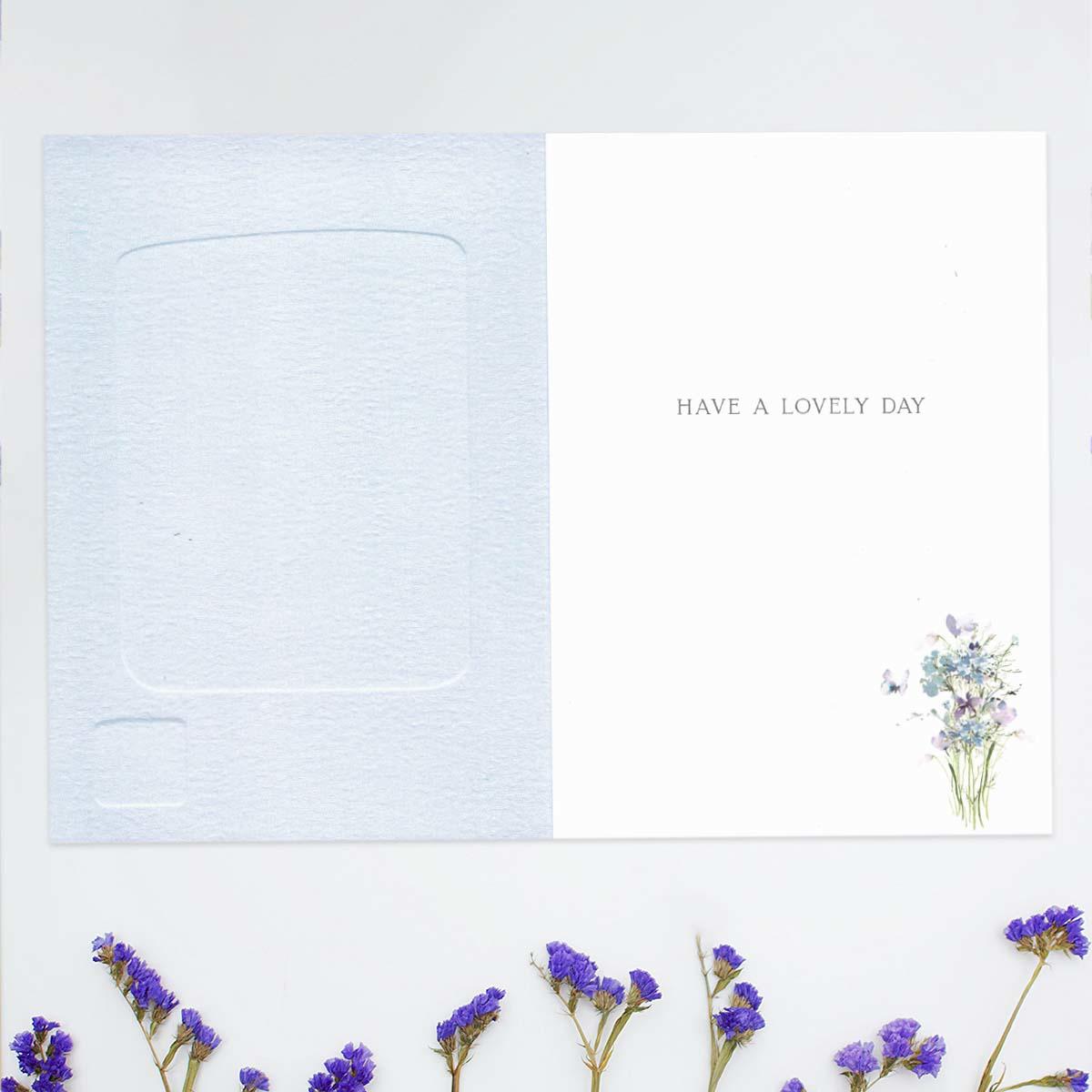 Inside with colour print and greeting