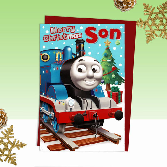 Son Thomas Christmas Card Alongside Its Red Envelope