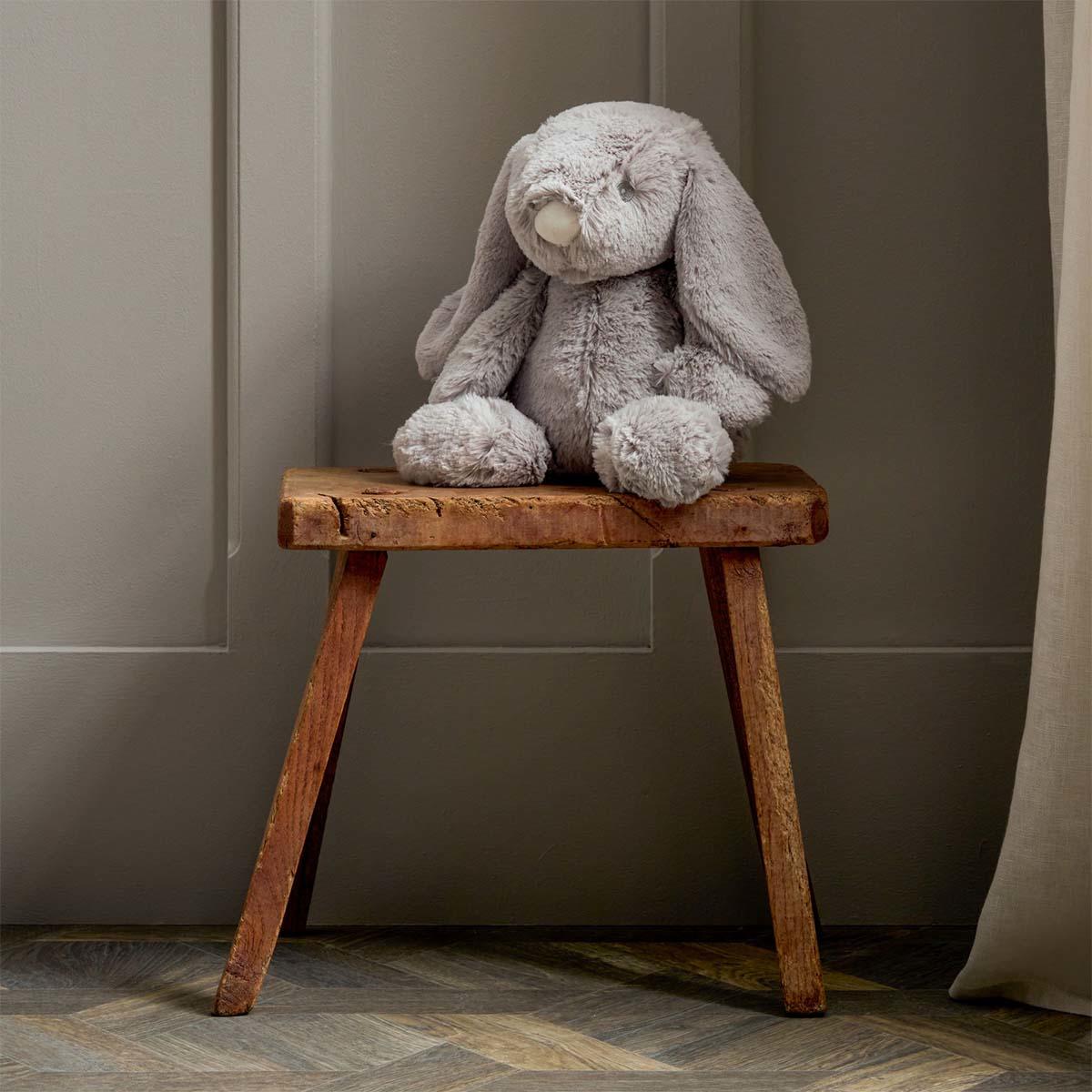 Large Rabbit Plush Displayed On Table