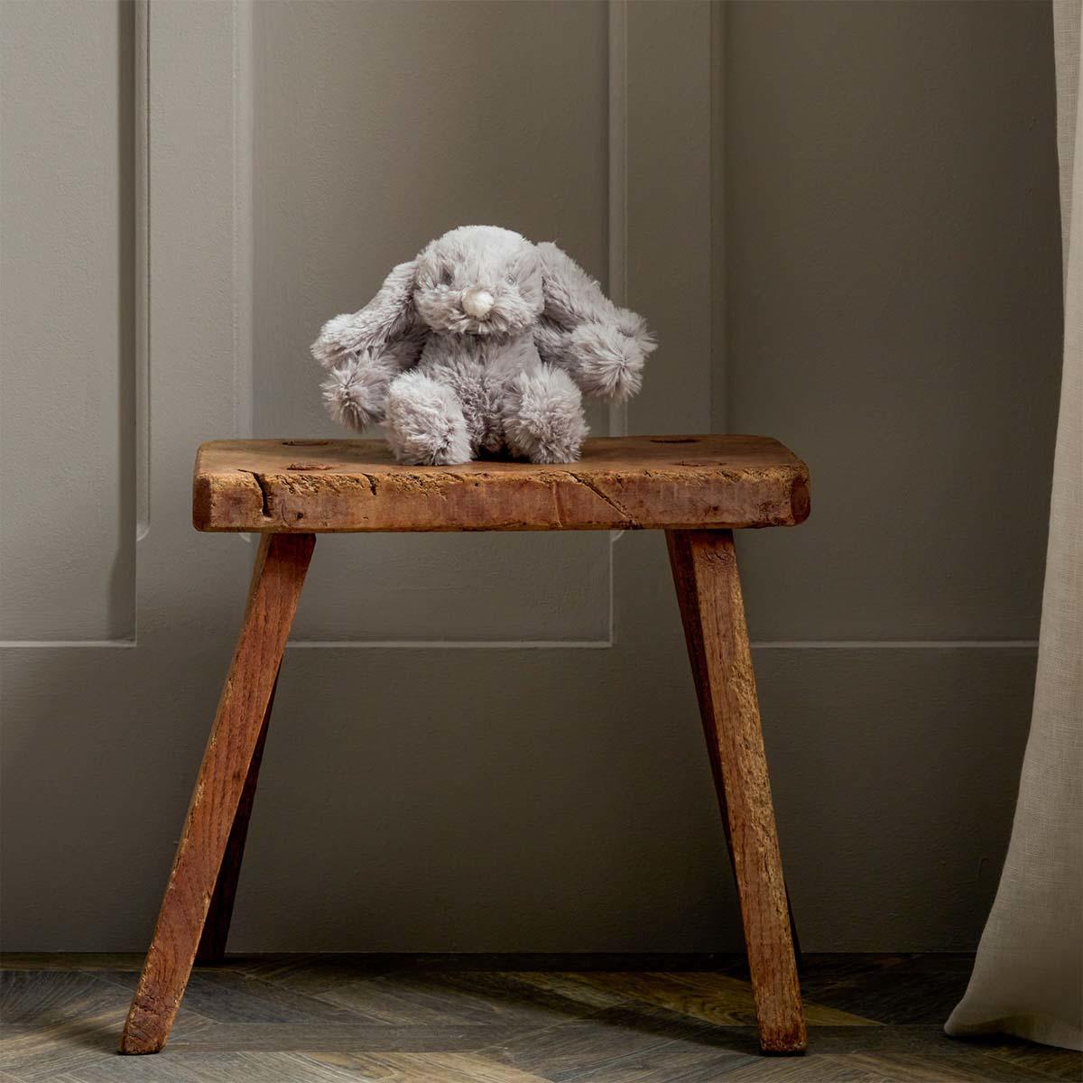 Shows Grey Rabbit On A Display Table