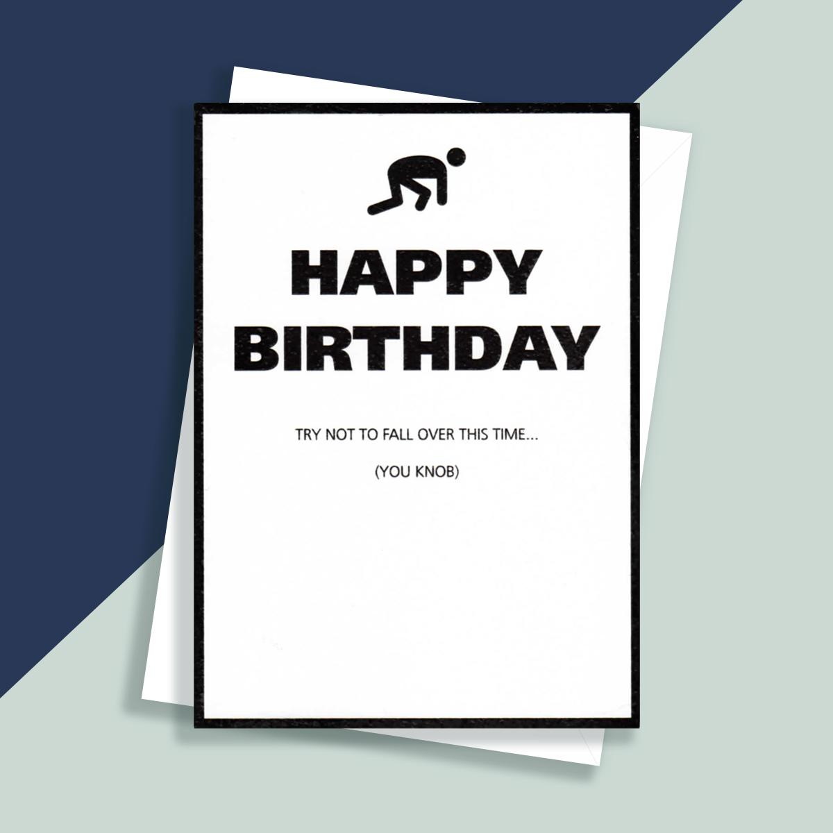 Rude Black And White Birthday Card Sitting On A Display Shelf