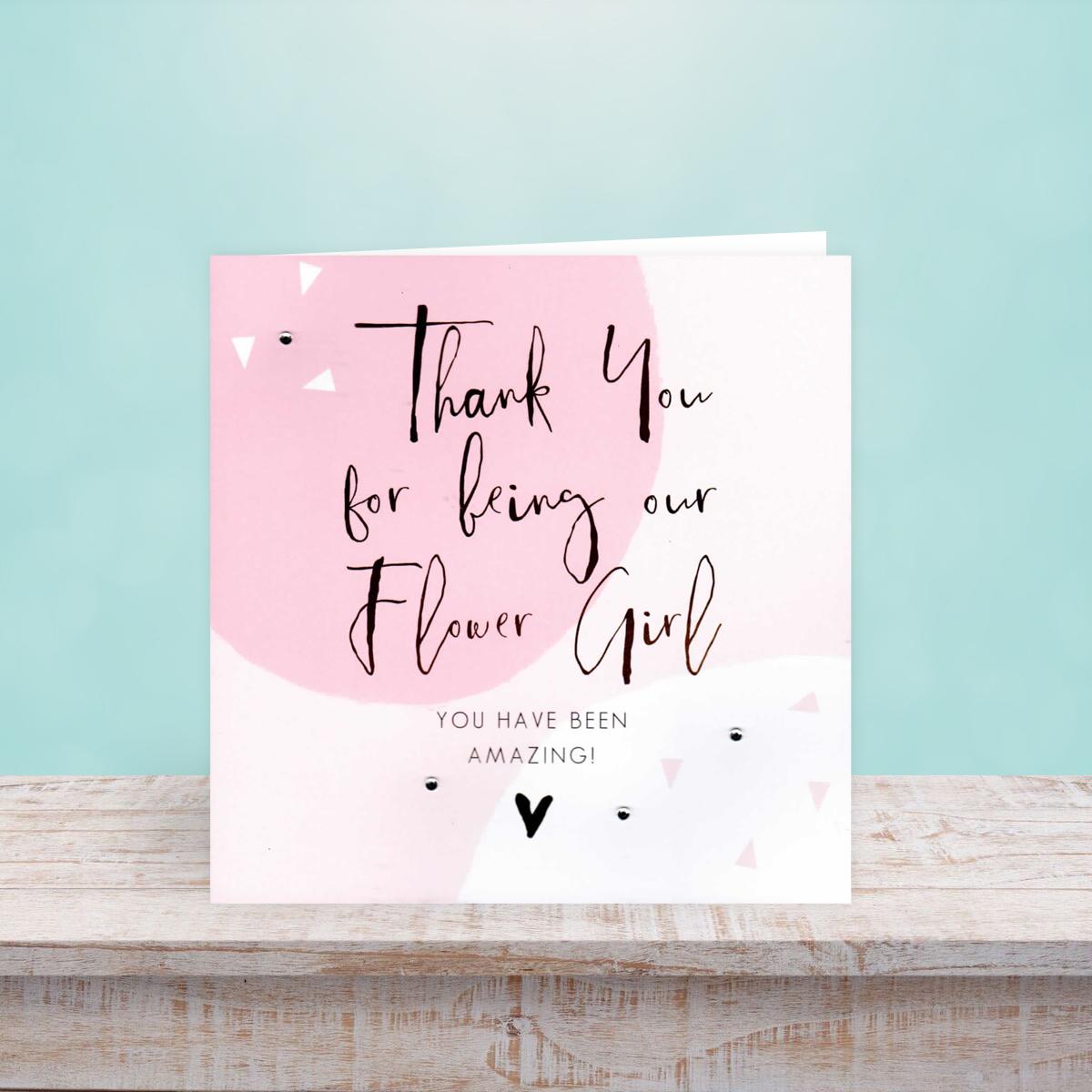 Flower Girl Card Sitting On A Display Shelf