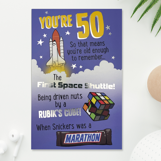 Front image showing purple theme card with cartoon images of a the first space shuttle, as rubiks cube and a marathon